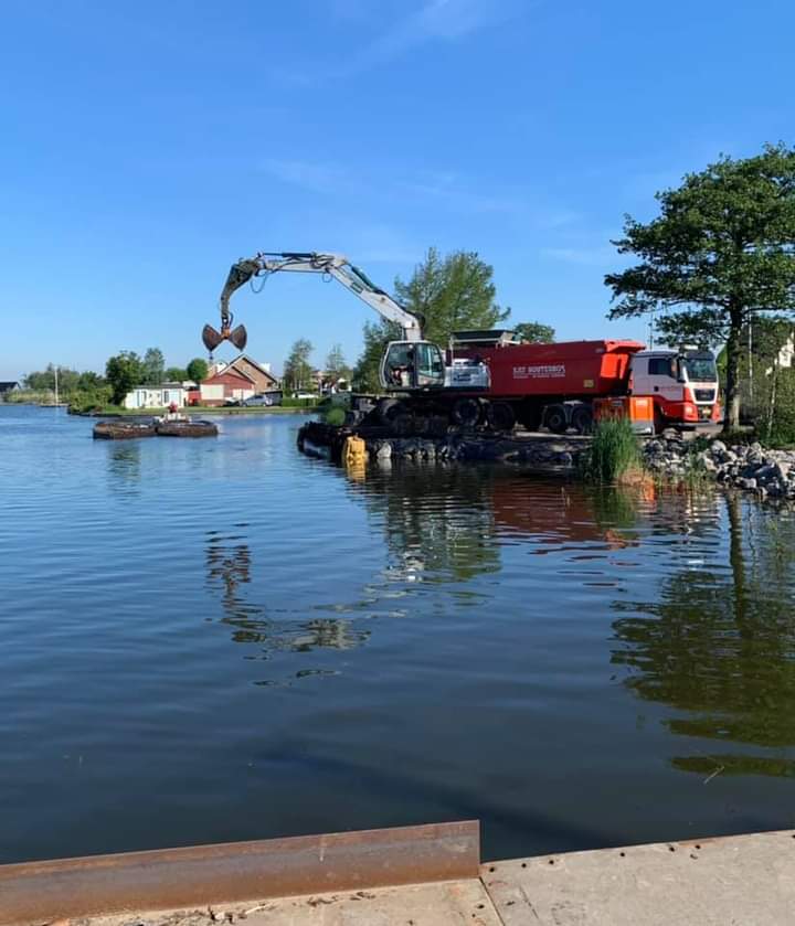 Baggeren en baggertransport
